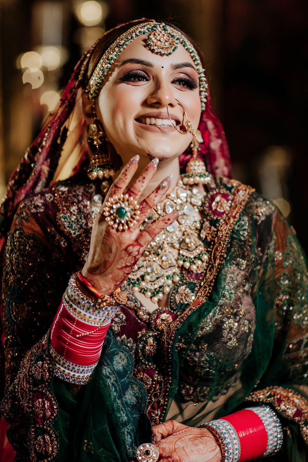 Bride in traditional bridal jewellery, photographed by Foto Vision